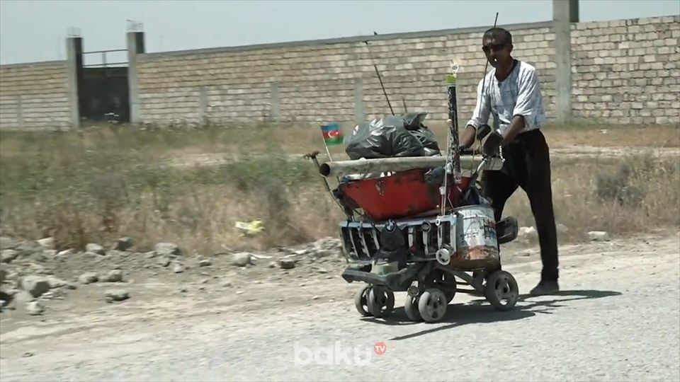 Həyatını "BMW"yə dəyişən adam - VİDEOREPORTAJ