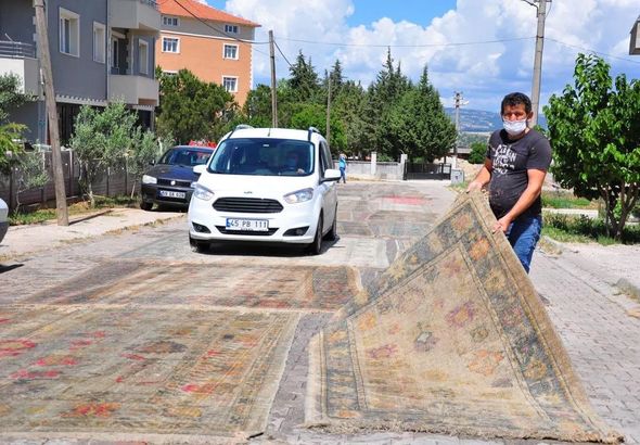 İxrac məqsədilə hazırlanan xalçalar nə üçün yolun ortasına sərilir? - FOTO