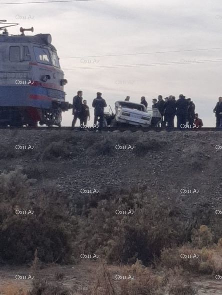 Azərbaycanda qatar avtomobillə toqquşdu: Ölənlərin adları bilindi - YENİLƏNİB + FOTO
