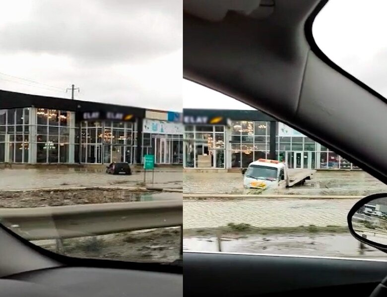 Bakıda suda batmış maşını çıxarmağa gələn evakuator da suda ilişib qaldı - VİDEO