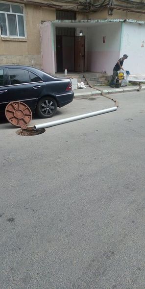 Bakıda binanın zirzəmisinə dolan çirkab suları təmizləndi - FOTO