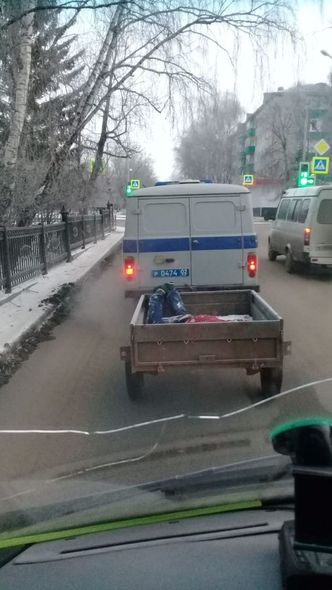 Polislər meyiti qoşquda apardılar - FOTO