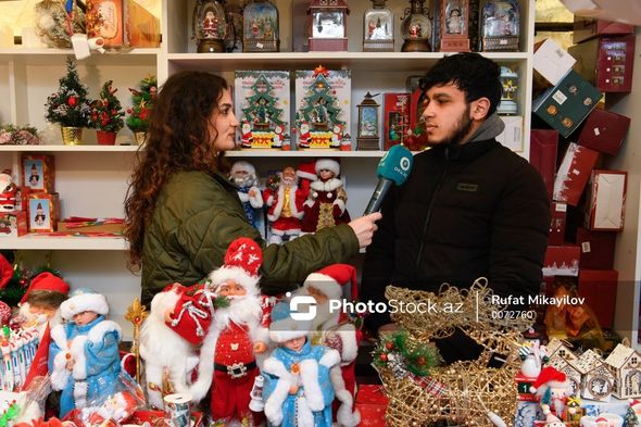 10 manatlıq ağacın altında 15 manatlıq 